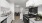 a kitchen with white cabinets