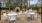 a group of tables and chairs outside